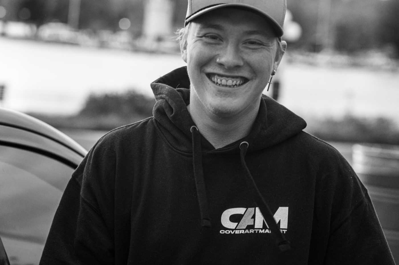 Dameon Spencer smiling, black and white portrait